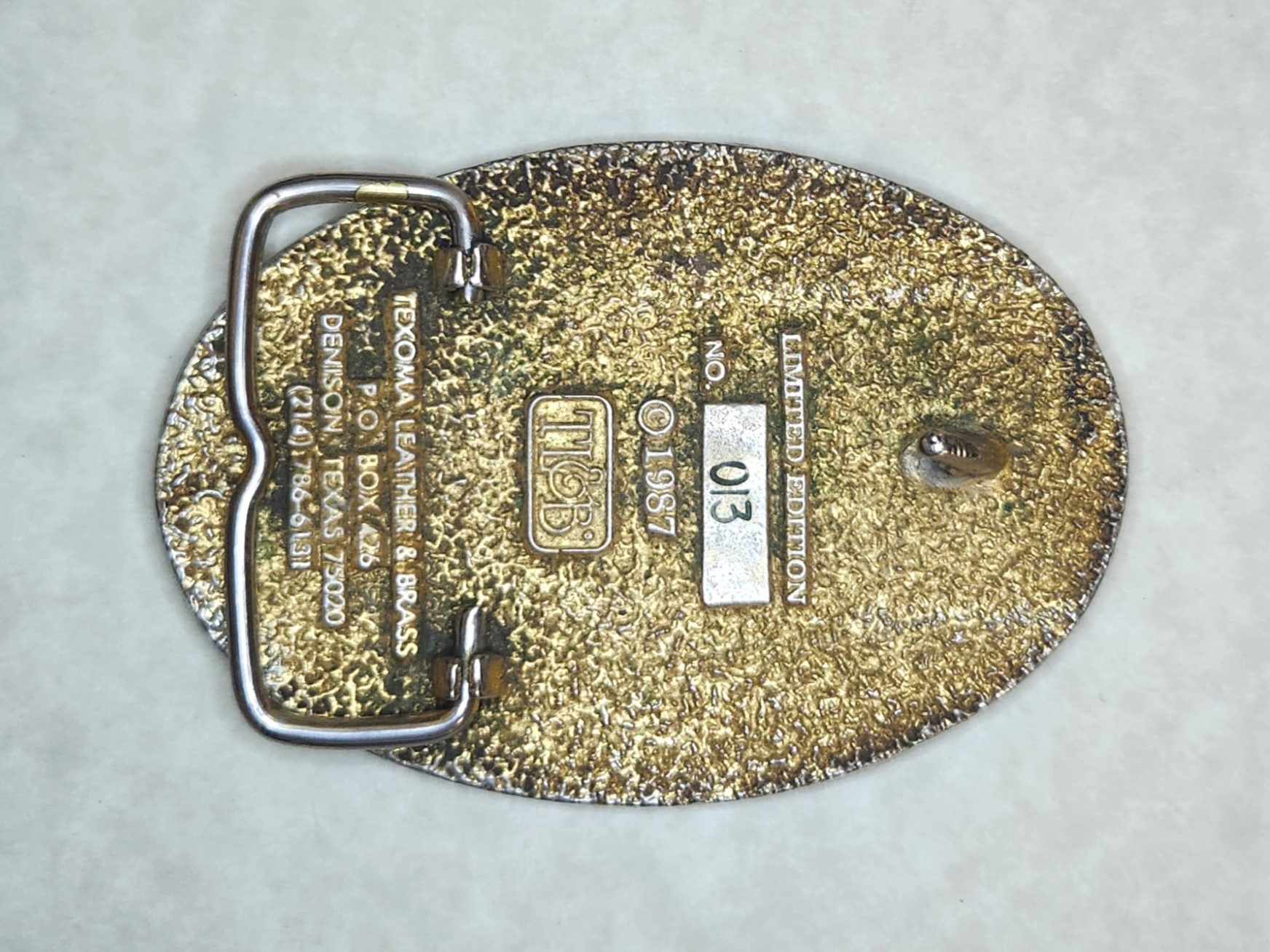 [Buckle Pic Missing] (Click here)